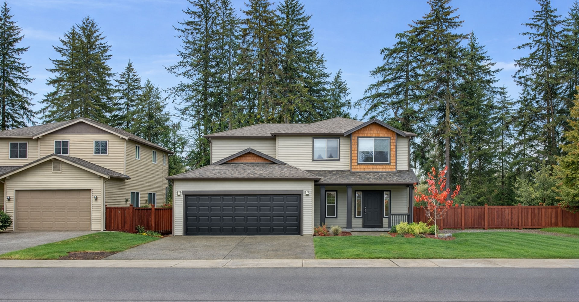 Modern house exterior featuring a fresh garage door