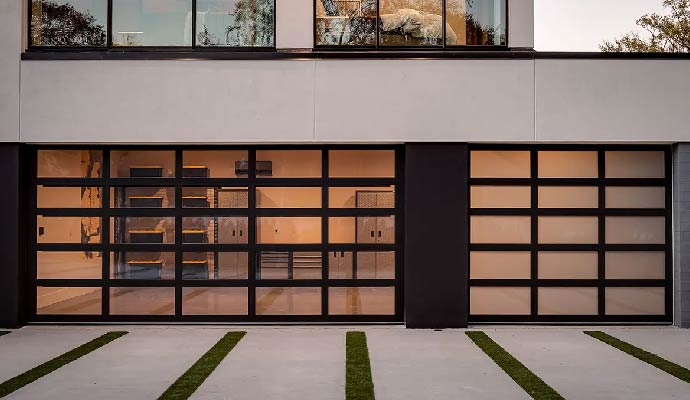 Contemporary Clopay aluminum and glass full-view garage doors