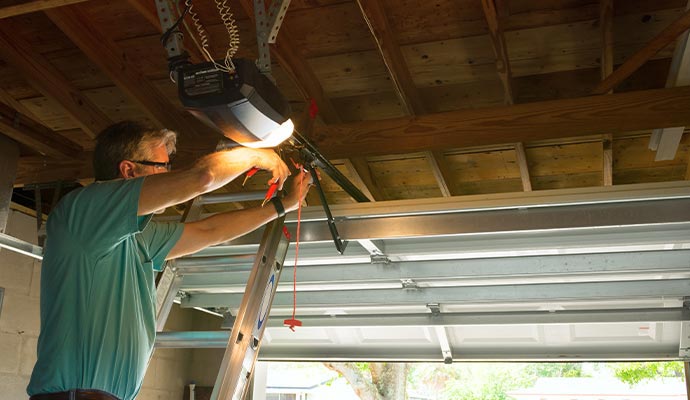 Expert installing garage door opener