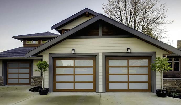 Residential garage featuring custom Haas doors