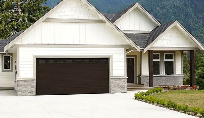 Home with an insulated steel Haas garage door