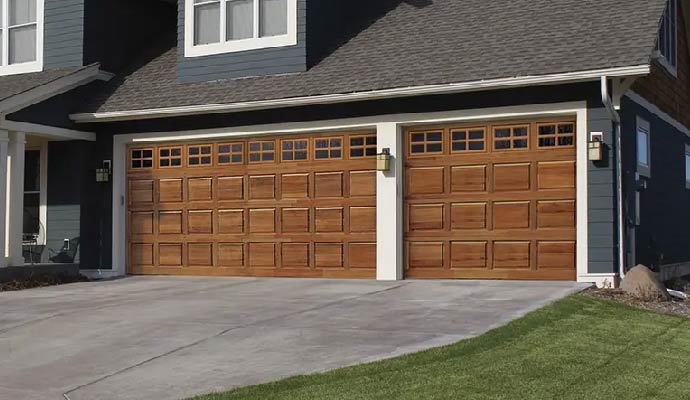 Natural wood finish Clopay garage doors