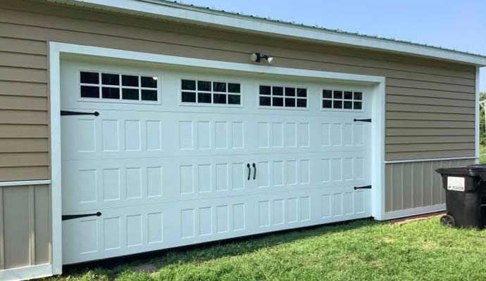 New garage door installed on a residential building