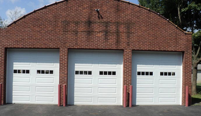 Installed three garage doors on a property